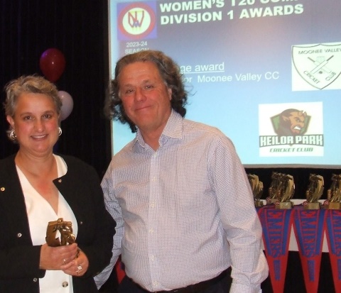 Sandra Verschoor receives her batting award from North West Metropolitan Cricket Association administrator Bill Maddern.