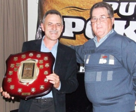 Phill King (left) receives the Lindsay Jones Trophy from our Club founder, Ray Storey.