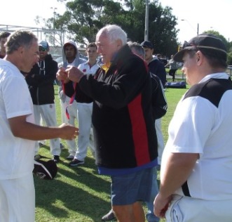 Dean Jukic gets his premiership medal from Ralph Barron, as our captain Mark Gauci looks on.
