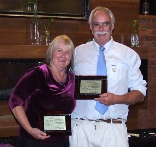 Proudly holding their Lindsay Jones Best Clubperson plaques - Adele and Charlie Walker.