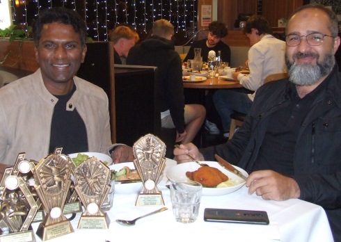 A table of trophies - Fourths captain Prem Janarthanan (left) and batting award winner Adeel Babur.